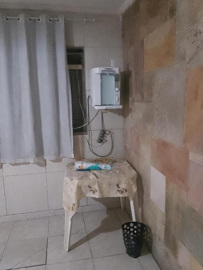 Quarto Individual com Banheiro Compartilhado